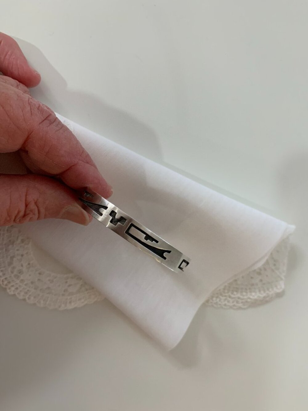 Vintage Sterling Silver Bangle Bracelet with an signature (image) inside.